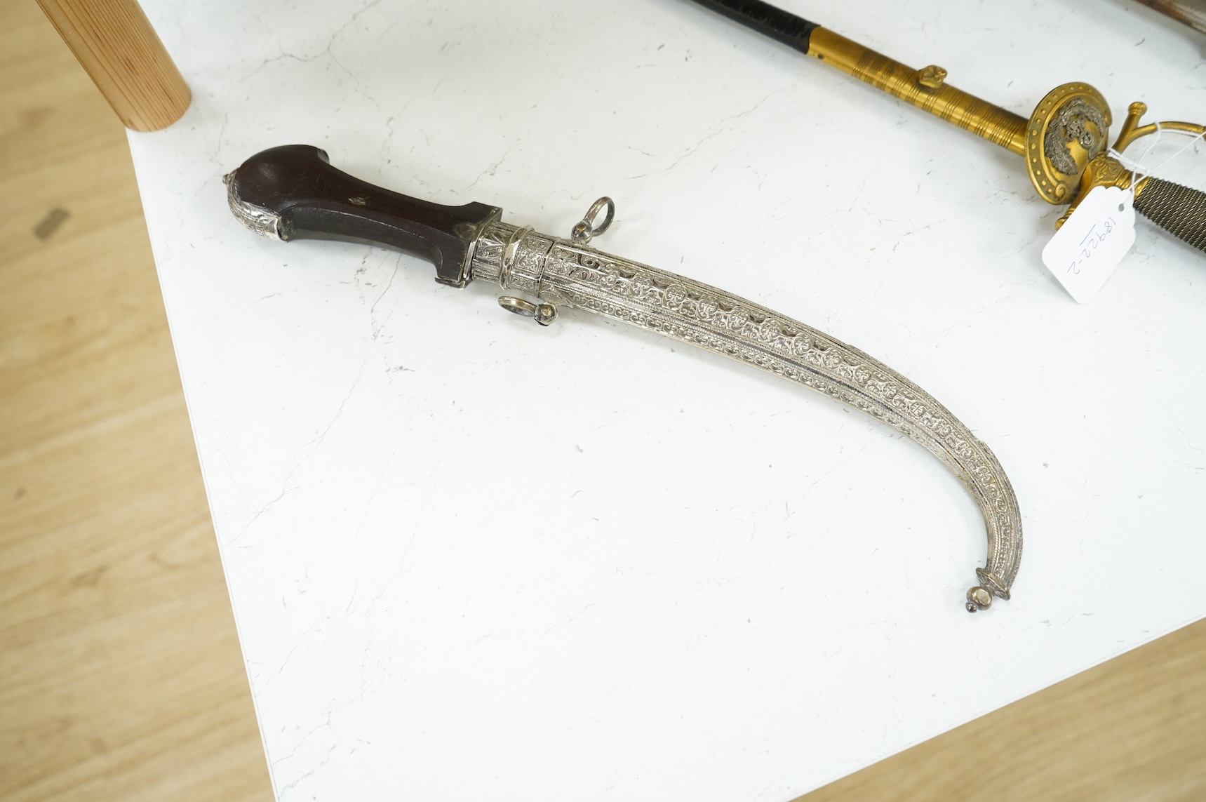 A cased Moroccan hallmarked silver mounted hardwood handled dagger jambya, overall length 42cm